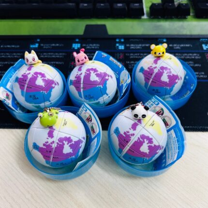 Five spherical 2x2x2s, each depicting a stylized world map with five different pandas as keychain attachments. magic ball cubes